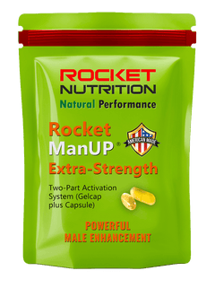 Green package of Rocket Nutrition Rocket ManUP Extra-Strength on a gray background