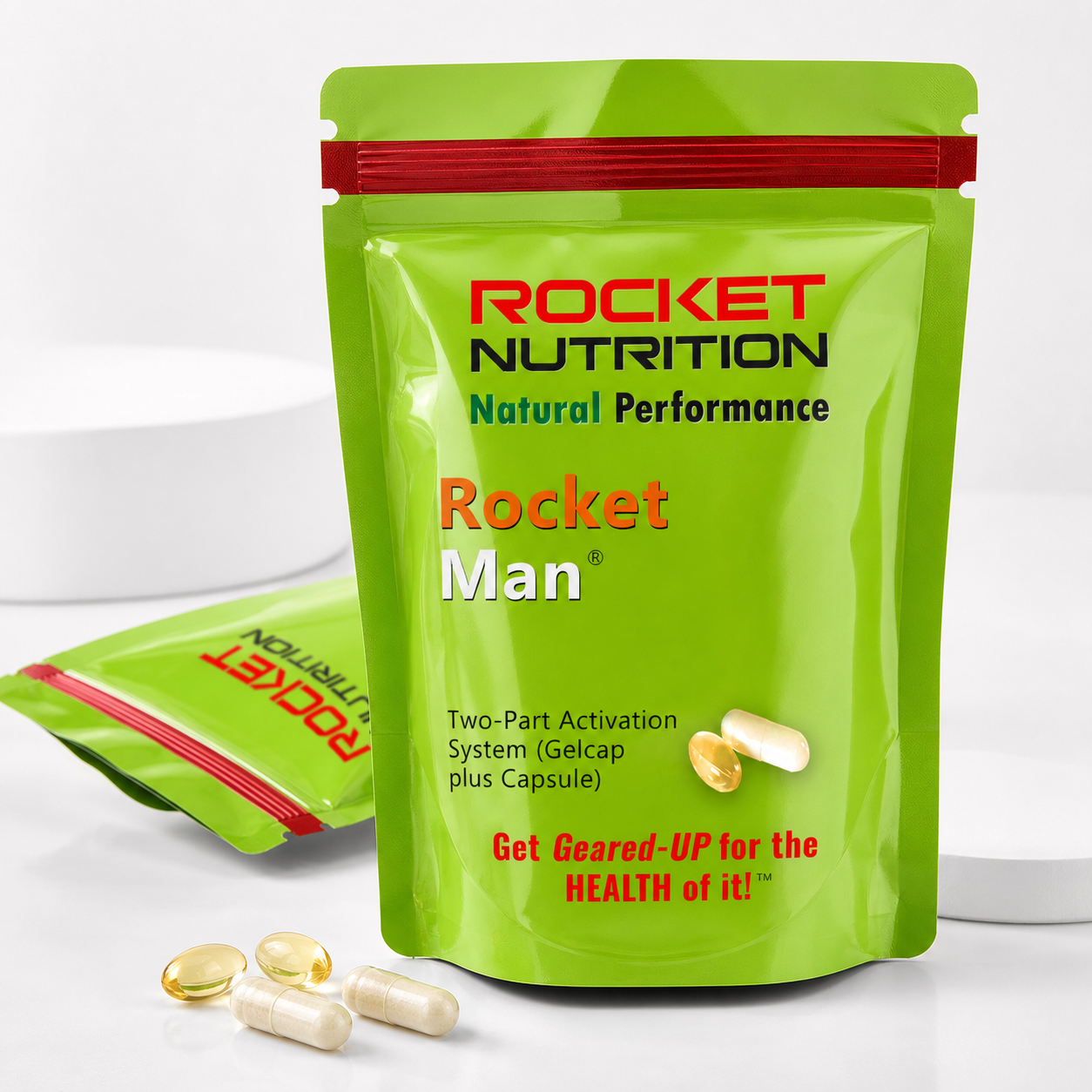 Rocket Man front and open pouch view with gelcaps and capsules – Rocket Nutrition men's natural vitality supplement, Get Geared-UP for the Health of it